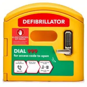 External locked DefibCaddy defibrillator cabinet featuring a STOP THE BLEED sticker, designed to secure life-saving equipment like AEDs and bleed control kits.