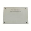 Empty white plaque to be engraved with a logo or dedication.