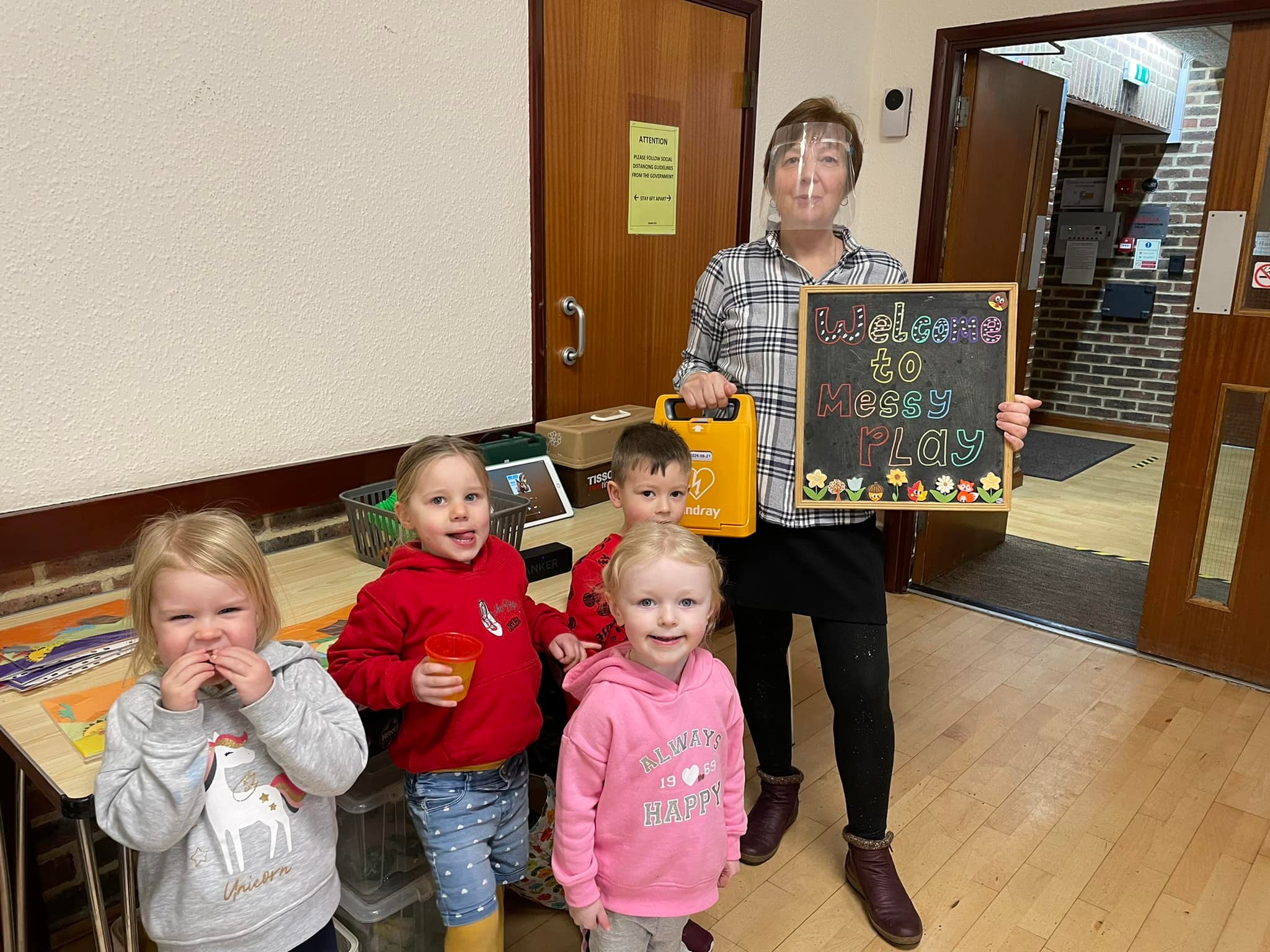 Mindray AED donation at Messy Play event with children and staff - Providing essential AED support for children's safety in educational activities